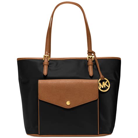 michael kors nylon jet set tote|Michael Kors bag with airplanes.